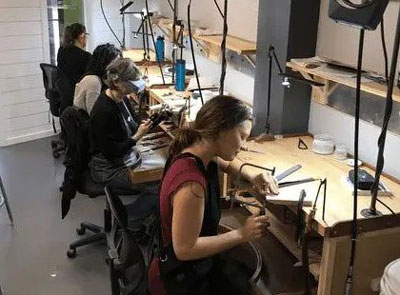 Students learning jewelry making at Metal Arts Academy in Auburn